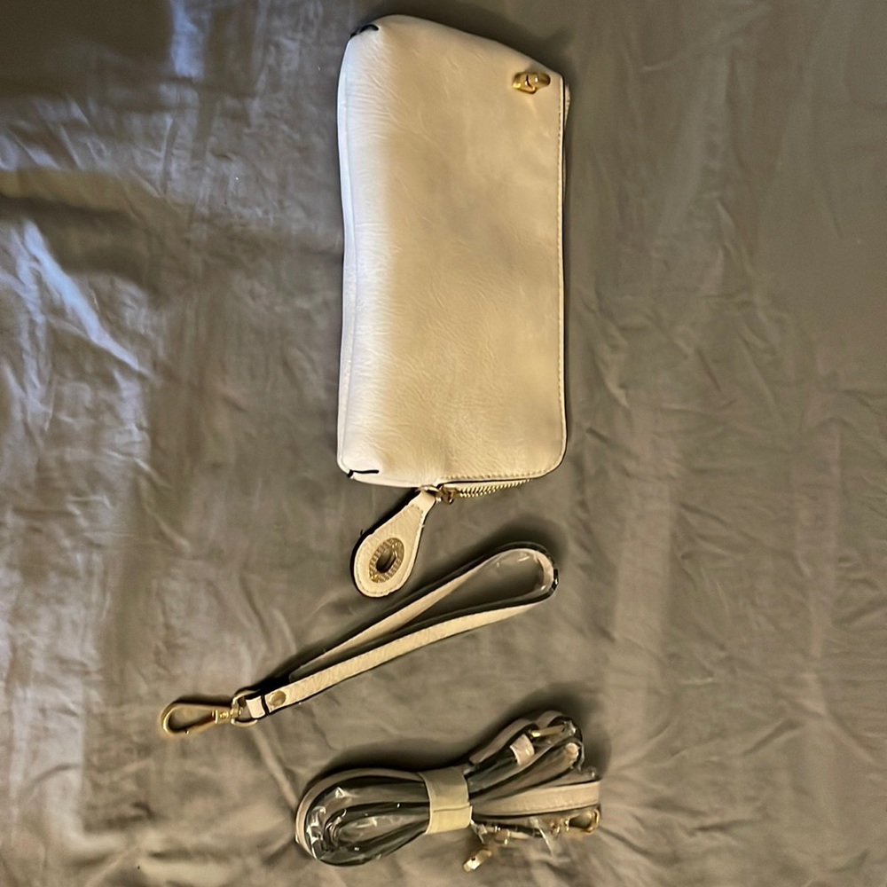Cream you can use it as wristlet, purse or around your waist